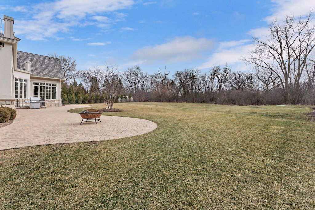 The Home in Illinois is a luxurious gated home with great attention to detail throughout now available for sale. This home located at 403 Fox Trail Ln, Oak Brook, Illinois; offering 06 bedrooms and 08 bathrooms with 11,161 square feet of living spaces.