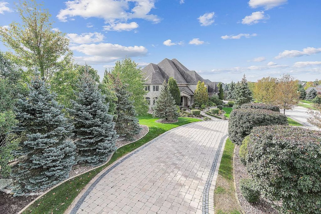 The Home in Illinois is a luxurious home sit on a completely private resort like setting now available for sale. This home located at 20105 Alison Trl, Mokena, Illinois; offering 07 bedrooms and 17 bathrooms with 30,000 square feet of living spaces. 