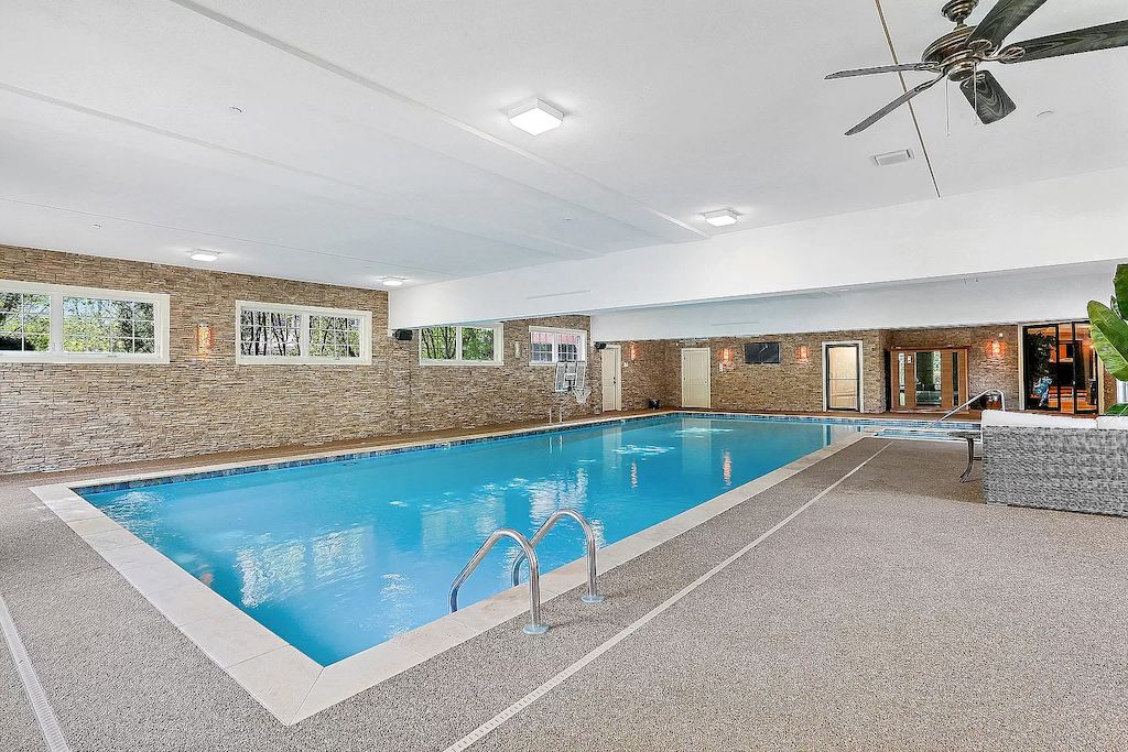 The Home in Illinois is a luxurious home sit on a completely private resort like setting now available for sale. This home located at 20105 Alison Trl, Mokena, Illinois; offering 07 bedrooms and 17 bathrooms with 30,000 square feet of living spaces. 