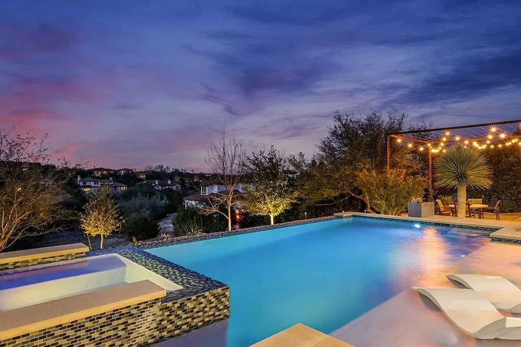 The Home in Austin is a Spanish Oaks contemporary home with sweeping views from virtually every window along the backside now available for sale. This home located at 11724 Musket Rim St, Austin, Texas