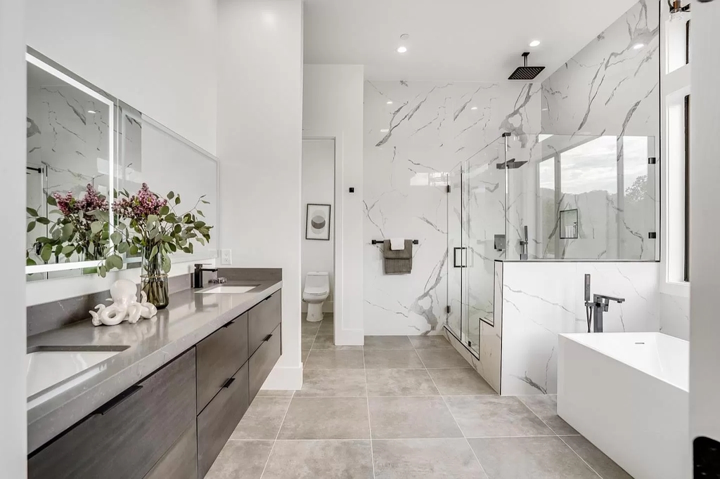 The Home in San Jose is a luxurious modern property has an emphasis on sleekness now available for sale. This home located at 7165 Red Holly Ct, San Jose, California