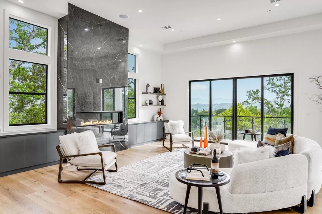 The Home in San Jose is a luxurious modern property has an emphasis on sleekness now available for sale. This home located at 7165 Red Holly Ct, San Jose, California