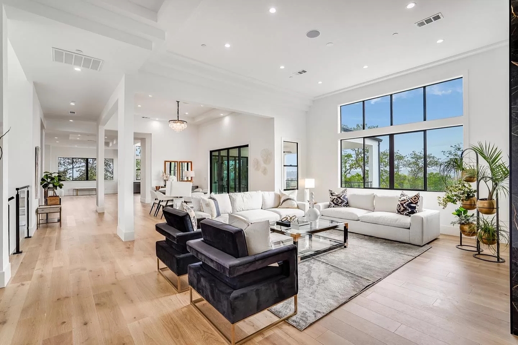 The Home in San Jose is a luxurious modern property has an emphasis on sleekness now available for sale. This home located at 7165 Red Holly Ct, San Jose, California