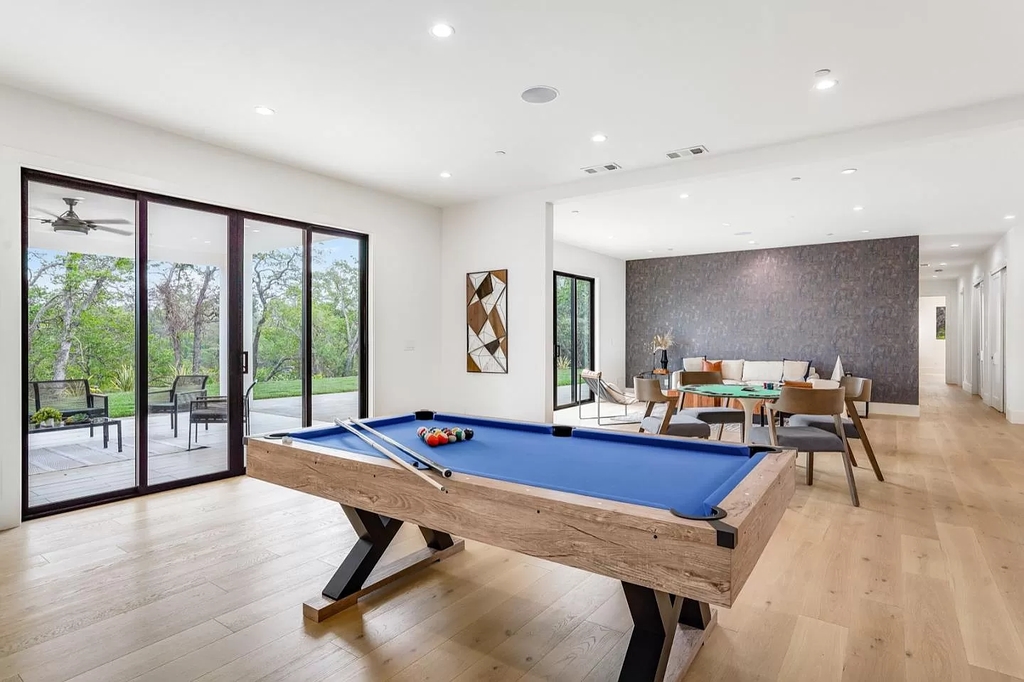 The Home in San Jose is a luxurious modern property has an emphasis on sleekness now available for sale. This home located at 7165 Red Holly Ct, San Jose, California