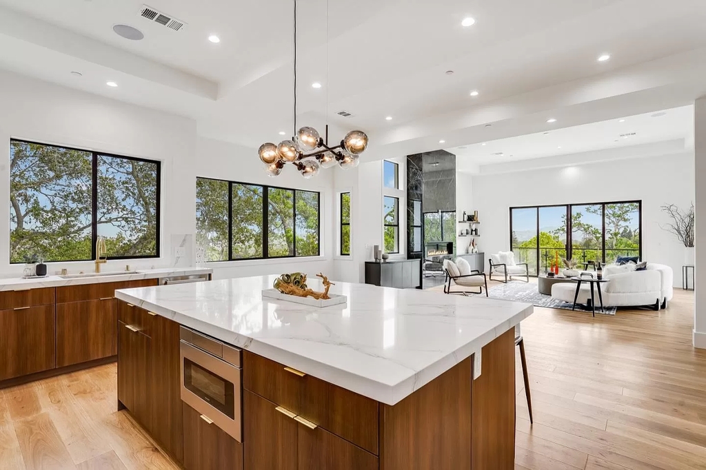 The Home in San Jose is a luxurious modern property has an emphasis on sleekness now available for sale. This home located at 7165 Red Holly Ct, San Jose, California