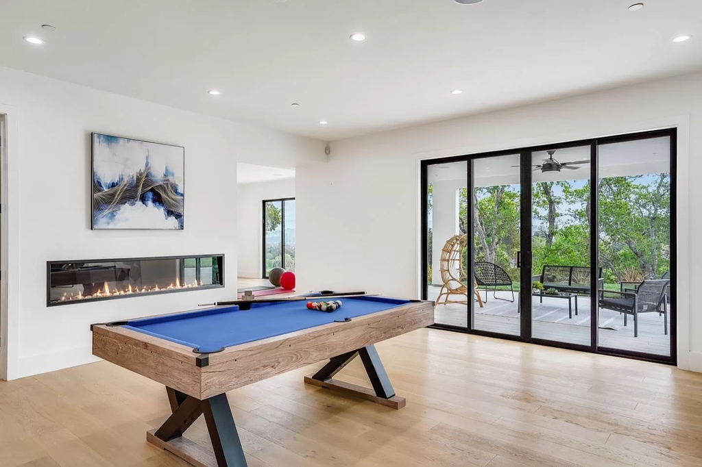 The Home in San Jose is a luxurious modern property has an emphasis on sleekness now available for sale. This home located at 7165 Red Holly Ct, San Jose, California