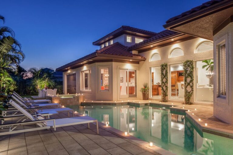 This $5,995,000 Custom Home in Naples features Exceptional Floor Plan with The Upmost Attention to Detail