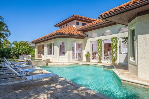 This $5,995,000 Custom Home in Naples features Exceptional Floor Plan