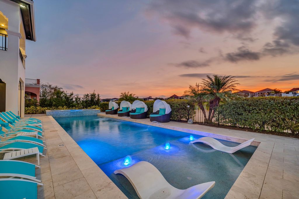 The Home in Reunion is a stunning fully furnished residence has an open contemporary floor plan which exudes luxury now available for sale. This home located at 521 Muirfield Loop, Reunion, Florida