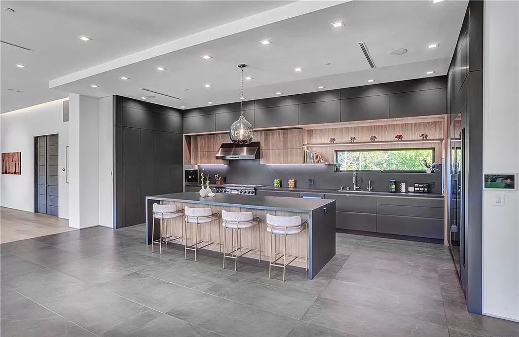 The Home in Tarzana is a modern architectural masterpiece offers European elegance with unsurpassed sophistication of unprecedented scale now available for sale. This home located at 19333 Rosita St, Tarzana, California