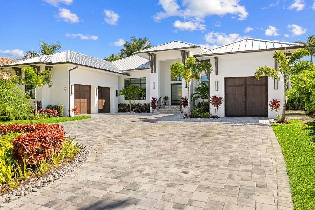 The Home in Naples is a newly built open concept home located in the highly desirable Moorings neighborhood now available for sale. This house located at 3300 Crayton Rd, Naples, Florida