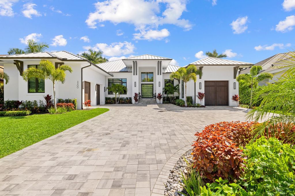 The Home in Naples is a newly built open concept home located in the highly desirable Moorings neighborhood now available for sale. This house located at 3300 Crayton Rd, Naples, Florida