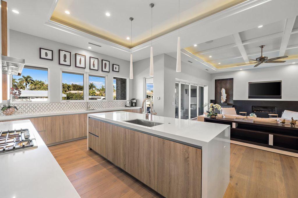 The Home in Naples is a sleek estate with a spacious interior and exquisite finishes on every surface now available for sale. This home located at 1275 Wahoo Ct, Naples, Florida