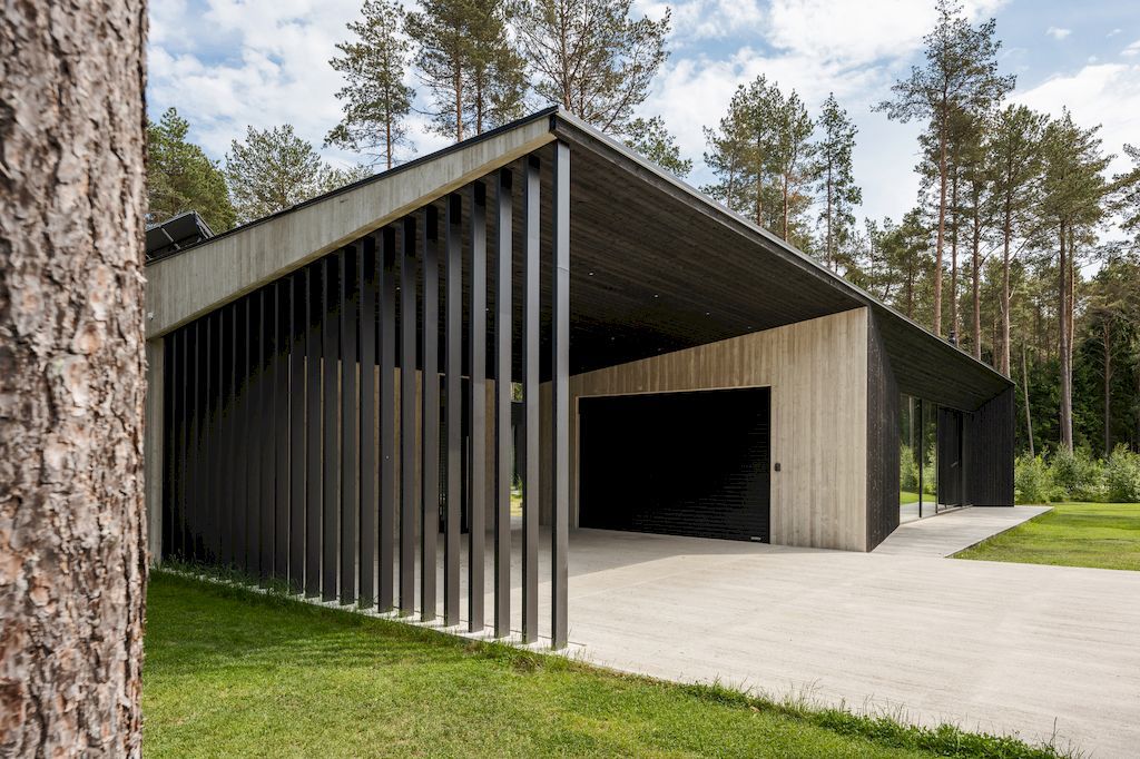 U shaped House Estonian wraps around a private garden by Kuu Arhitektid