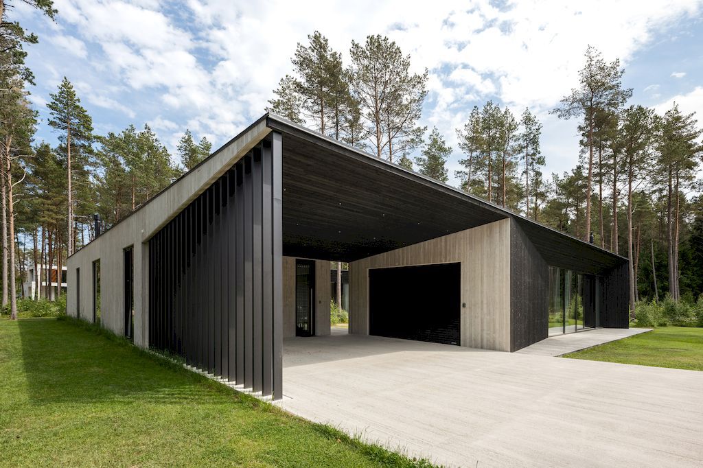 U shaped House Estonian wraps around a private garden by Kuu Arhitektid