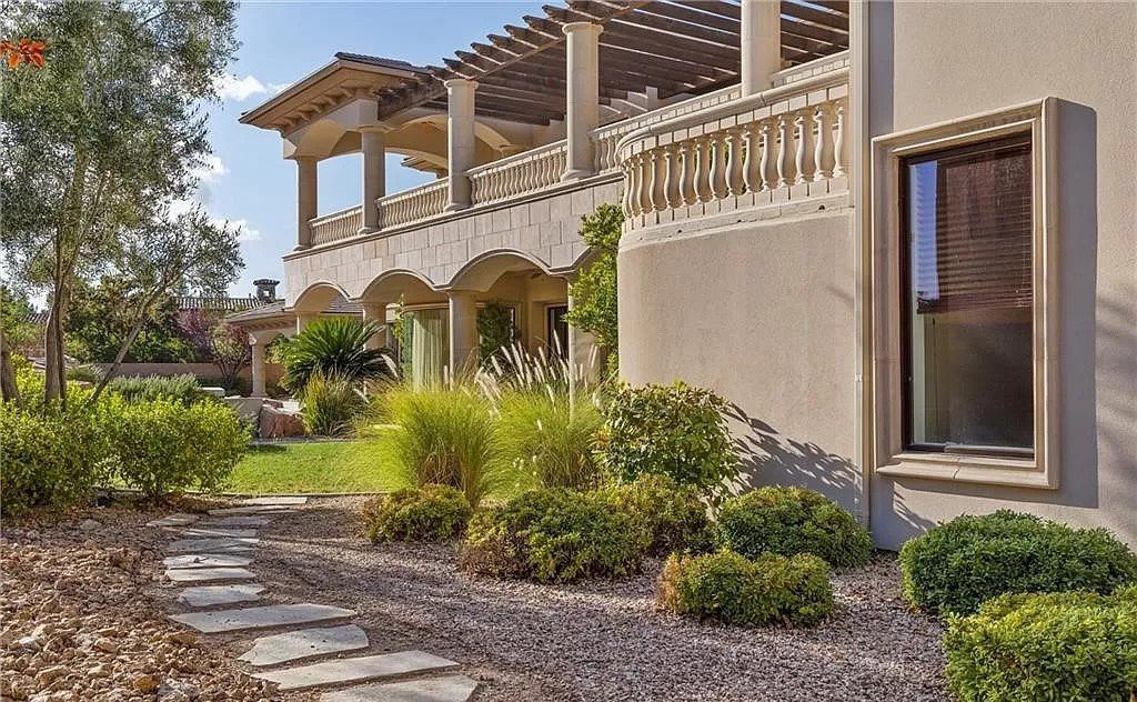 This $4,200,000 Stylish Two Story Custom Estate in Nevada has oasis style backyard