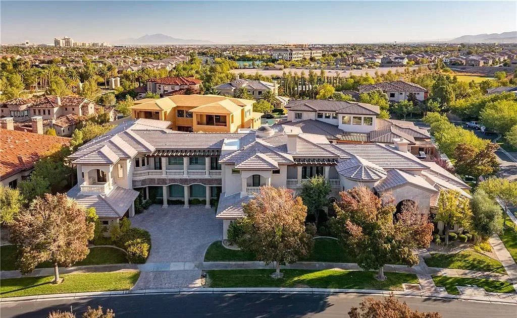 This $4,200,000 Stylish Two Story Custom Estate in Nevada has oasis style backyard