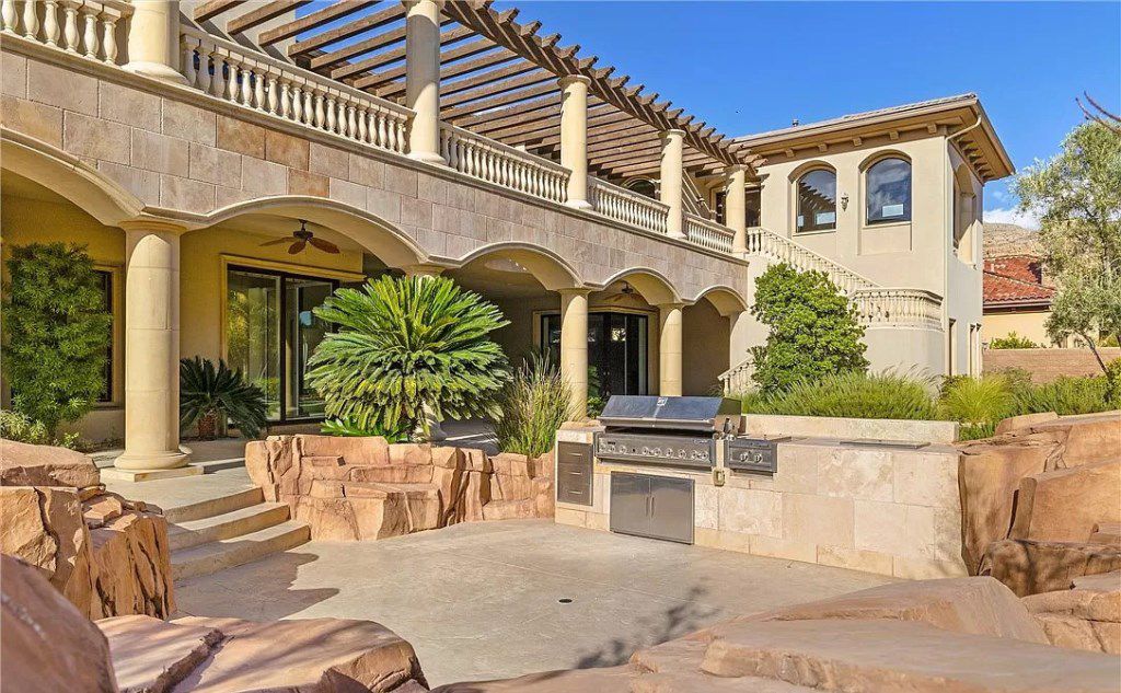 This $4,200,000 Stylish Two Story Custom Estate in Nevada has oasis style backyard