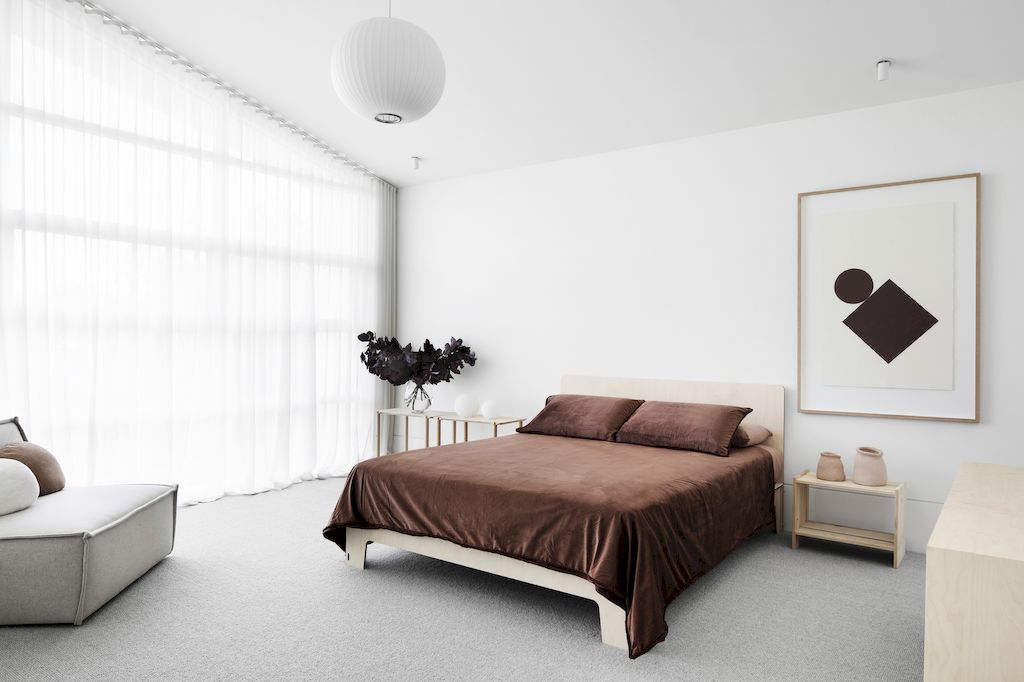 Minimalist style reigns supreme with absolute simplicity in choosing tones for the bedroom with the main three tones of white, gray, and dark brown. Brownie brown bedding is the key element that makes this remarkable color combination more than perfect.