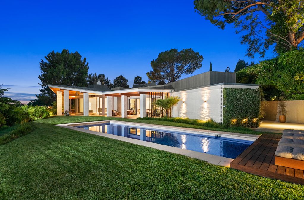 The Home in Beverly Hills is a true trophy of mid century modern design showcasing luxury, unparalleled scale and sophistication now available for sale. This home located at 960 N Alpine Dr, Beverly Hills, California