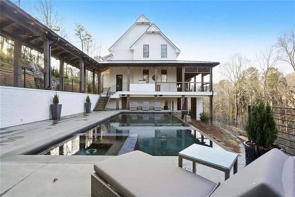 The Home in Georgia is a luxurious home completed with large light filled living space and gorgeous materials now available for sale. This home located at 5400 Lake Forrest Dr, Sandy Springs, Georgia; offering 06 bedrooms and 10 bathrooms with 8,340 square feet of living spaces.