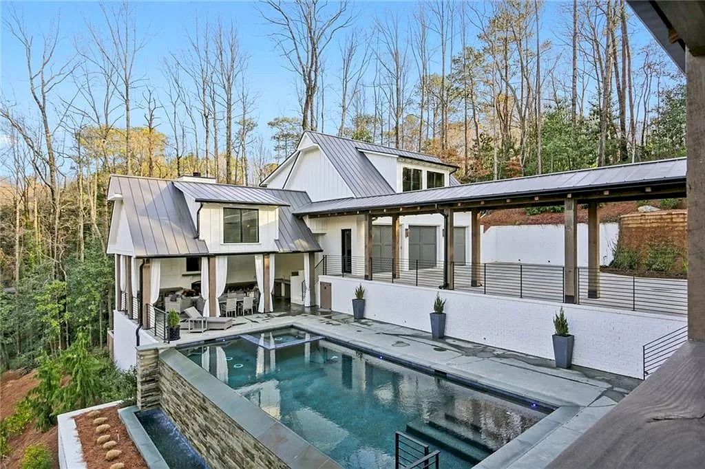 The Home in Georgia is a luxurious home completed with large light filled living space and gorgeous materials now available for sale. This home located at 5400 Lake Forrest Dr, Sandy Springs, Georgia; offering 06 bedrooms and 10 bathrooms with 8,340 square feet of living spaces.