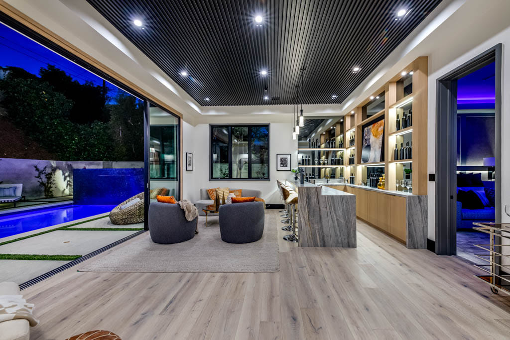 The Home in Encino is a brand new resort style estate with a large open floor plan generates an ideal flow for indoor outdoor living now available for sale. This home located at 4050 Contera Rd, Encino, Los Angeles, California;