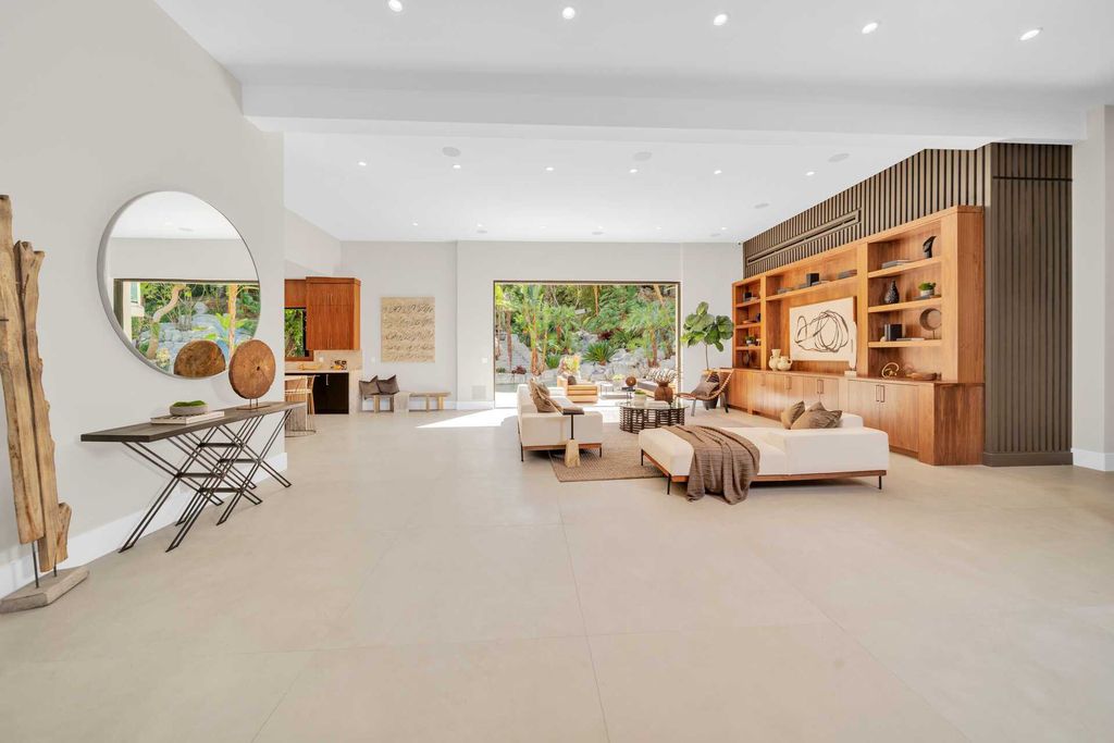 The Home in Encino is a privately gated contemporary offers sophistication, luxury, and relaxation boasting a pristine residence now available for sale. This home located at 4609 Louise Ave, Encino, California