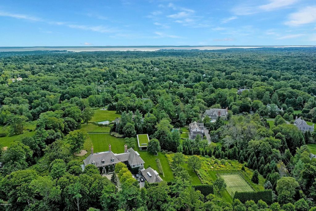 The Home in Connecticut is a luxurious home which is harmoniously combines modern and tradition aesthetics while using the finest materials and workmanship now available for sale. This home located at 15 Dairy Rd, Greenwich, Connecticut; offering 07 bedrooms and 13 bathrooms with 16,359 square feet of living spaces.