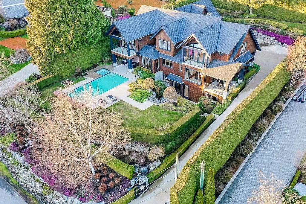 The House in West Vancouver is a gorgeous family home with stunning outdoor pool & hot tub, now available for sale. This home located at 645 Holmbury Pl, West Vancouver, BC V7S 1P8, Canada