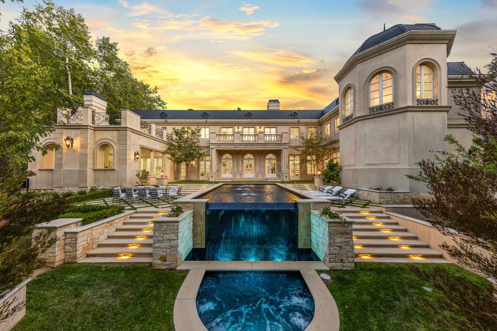 The Mansion in Bel Air is a French inspired estate boasts the finest finishes throughout sourcing antique materials from Europe now available for sale. This home located at 11630 Moraga Ln, Los Angeles, California