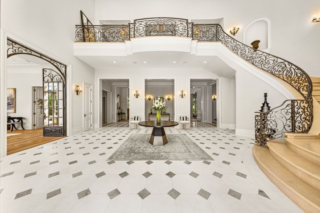 The Mansion in Bel Air is a French inspired estate boasts the finest finishes throughout sourcing antique materials from Europe now available for sale. This home located at 11630 Moraga Ln, Los Angeles, California