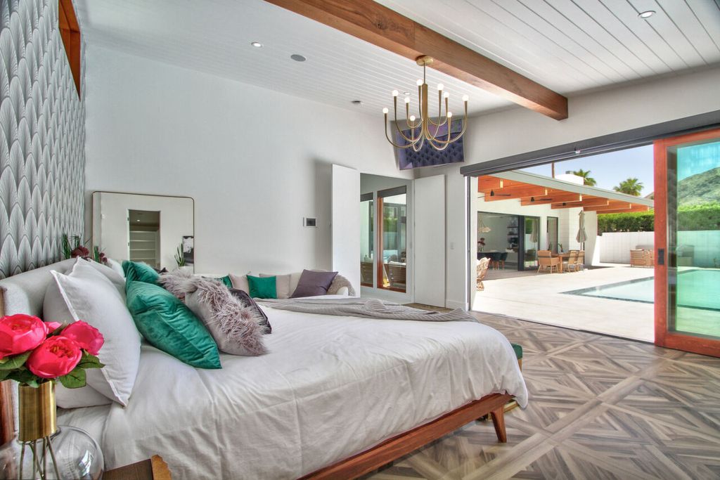 The Home in Palm Springs is a flawless mid century pool estate with the highest level of finish and sophistication surrounded by pristine mountain views now available for sale. This home located at 1189 N Rose Ave, Palm Springs, California