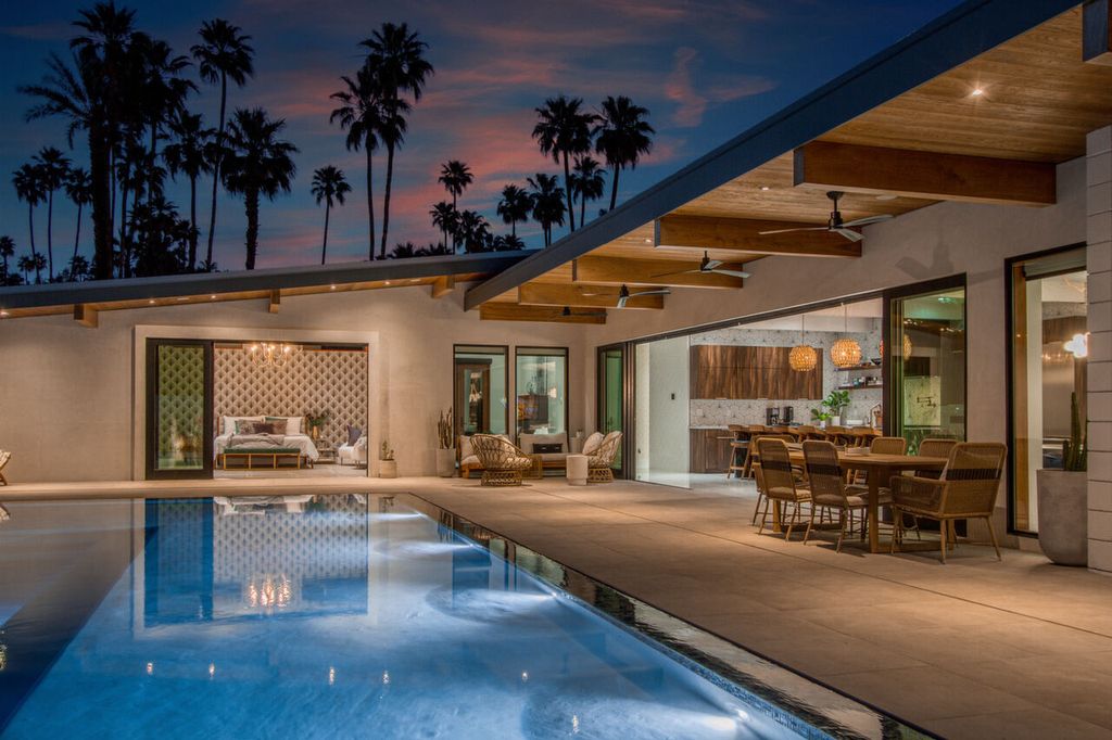 The Home in Palm Springs is a flawless mid century pool estate with the highest level of finish and sophistication surrounded by pristine mountain views now available for sale. This home located at 1189 N Rose Ave, Palm Springs, California