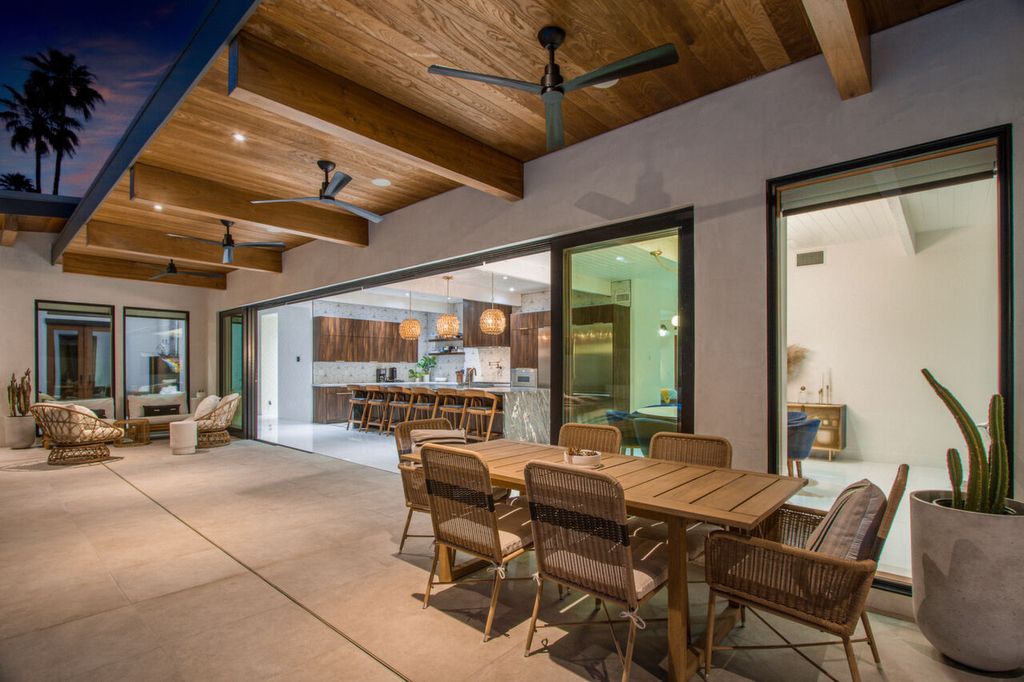 The Home in Palm Springs is a flawless mid century pool estate with the highest level of finish and sophistication surrounded by pristine mountain views now available for sale. This home located at 1189 N Rose Ave, Palm Springs, California