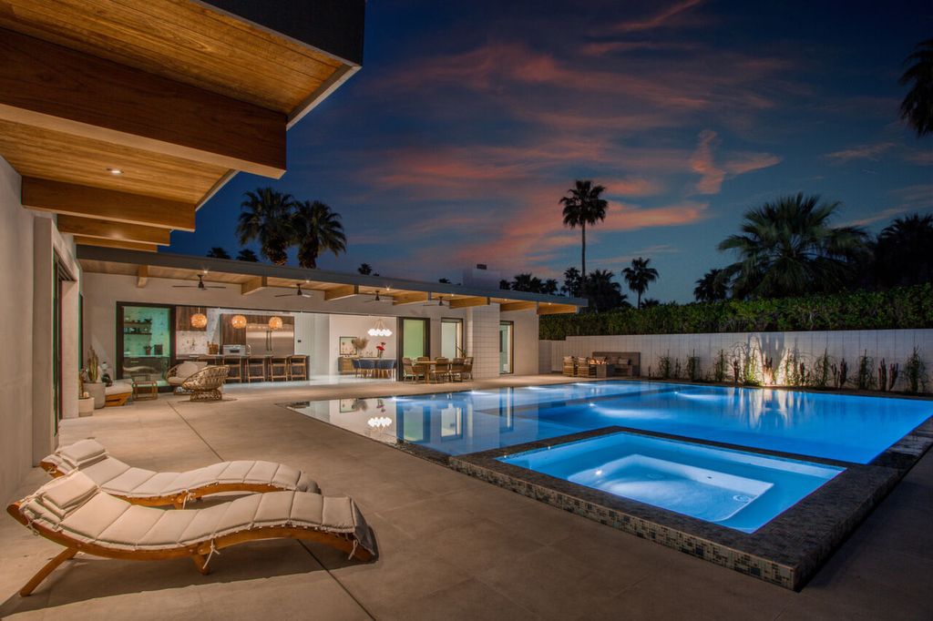 The Home in Palm Springs is a flawless mid century pool estate with the highest level of finish and sophistication surrounded by pristine mountain views now available for sale. This home located at 1189 N Rose Ave, Palm Springs, California