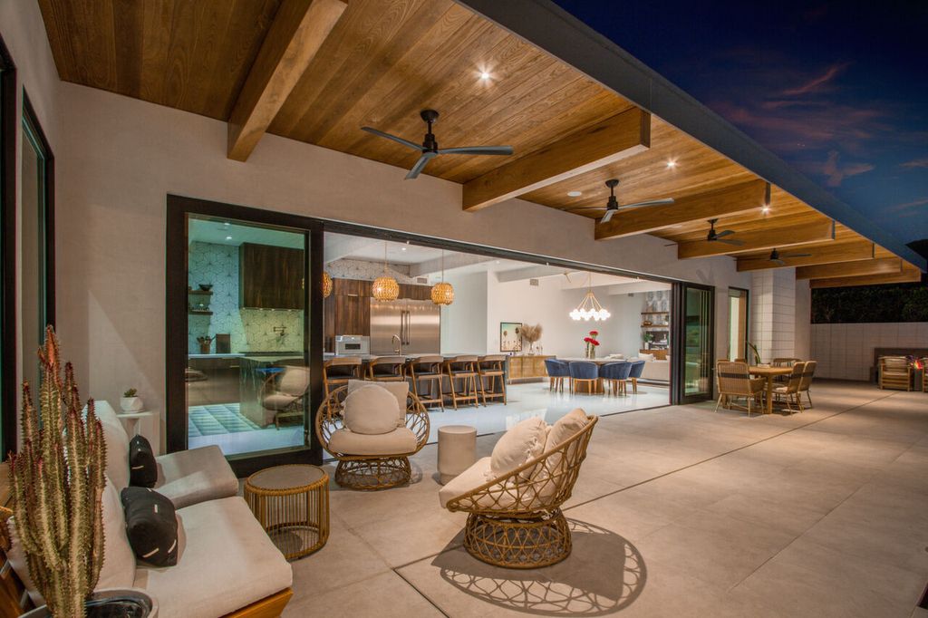 The Home in Palm Springs is a flawless mid century pool estate with the highest level of finish and sophistication surrounded by pristine mountain views now available for sale. This home located at 1189 N Rose Ave, Palm Springs, California