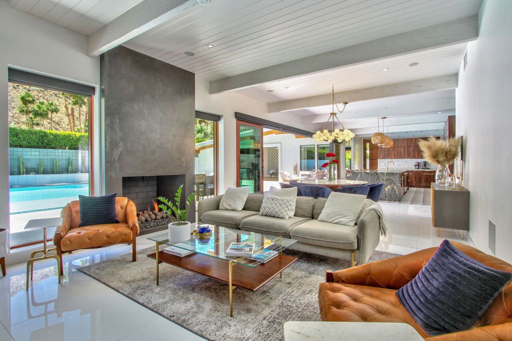 The Home in Palm Springs is a flawless mid century pool estate with the highest level of finish and sophistication surrounded by pristine mountain views now available for sale. This home located at 1189 N Rose Ave, Palm Springs, California