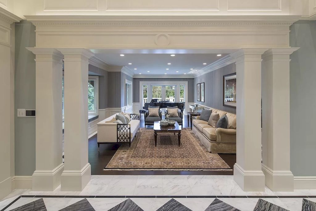 The Mansion in Vancouver is expertly finished to the epitome of craftsmanship with over-abundance of quality wainscotting & millwork throughout, now available for sale. This home located at 3989 Angus Dr, Vancouver, BC V6J 4H8, Canada