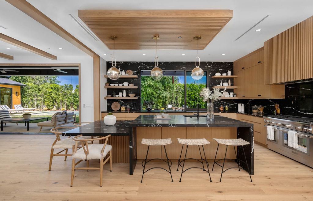 The Home in Encino is a brand new contemporary residence features an expansive open floor plan, with high ceilings and an elegant entrance now available for sale. This home located at 17600 Tarzana St, Encino, California