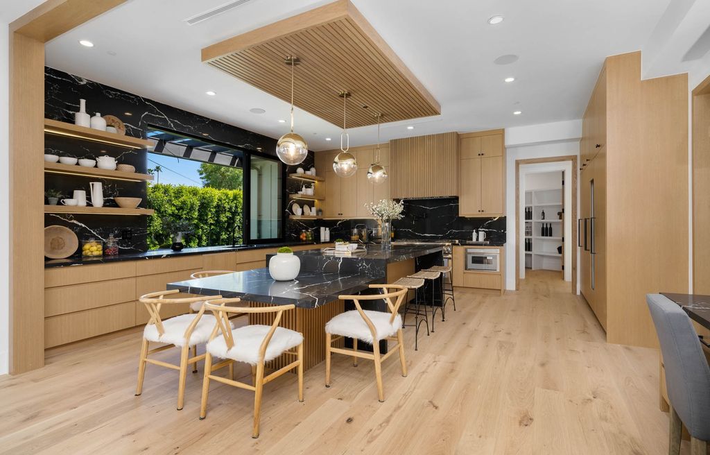 The Home in Encino is a brand new contemporary residence features an expansive open floor plan, with high ceilings and an elegant entrance now available for sale. This home located at 17600 Tarzana St, Encino, California