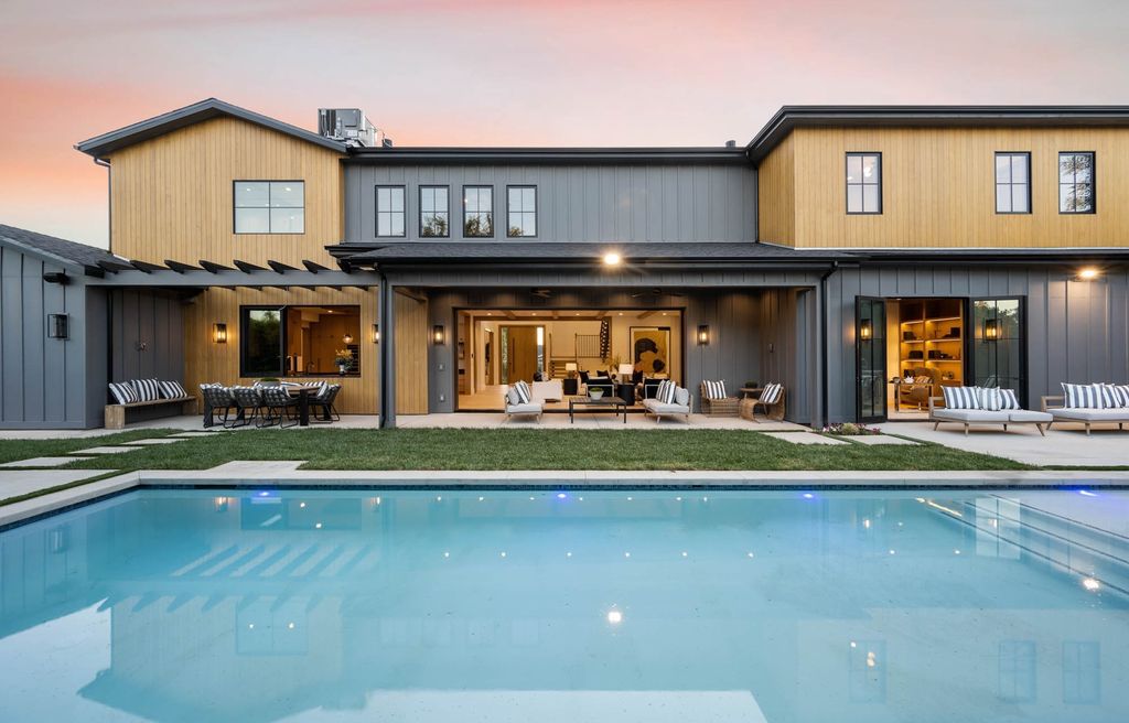The Home in Encino is a brand new contemporary residence features an expansive open floor plan, with high ceilings and an elegant entrance now available for sale. This home located at 17600 Tarzana St, Encino, California