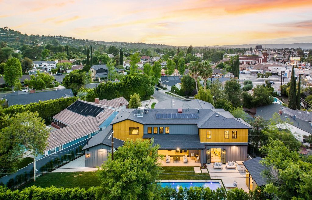 The Home in Encino is a brand new contemporary residence features an expansive open floor plan, with high ceilings and an elegant entrance now available for sale. This home located at 17600 Tarzana St, Encino, California