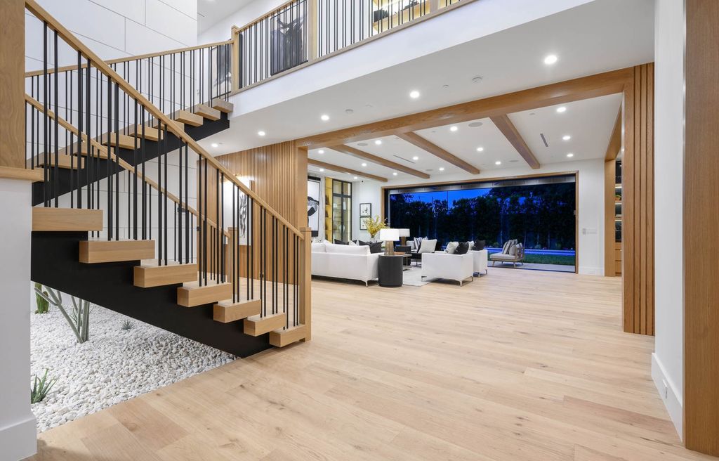 The Home in Encino is a brand new contemporary residence features an expansive open floor plan, with high ceilings and an elegant entrance now available for sale. This home located at 17600 Tarzana St, Encino, California