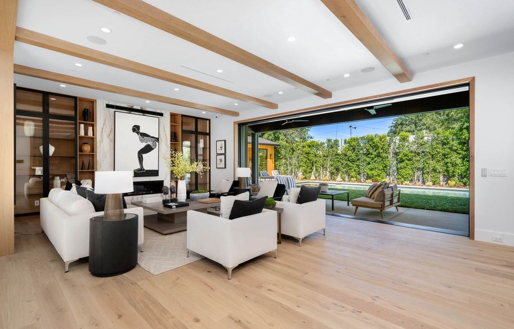 The Home in Encino is a brand new contemporary residence features an expansive open floor plan, with high ceilings and an elegant entrance now available for sale. This home located at 17600 Tarzana St, Encino, California