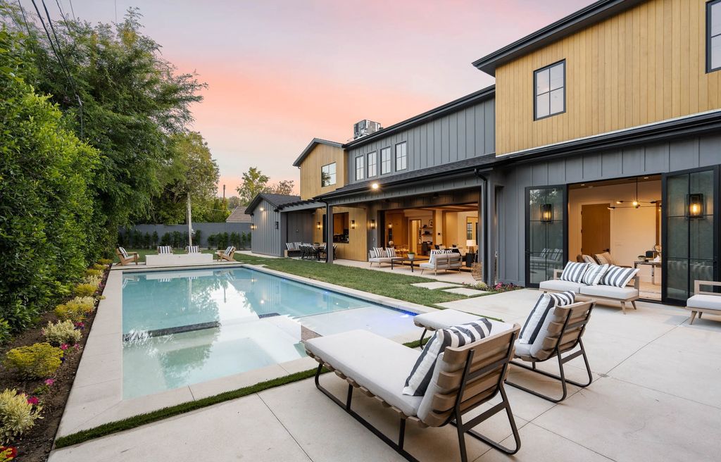 The Home in Encino is a brand new contemporary residence features an expansive open floor plan, with high ceilings and an elegant entrance now available for sale. This home located at 17600 Tarzana St, Encino, California