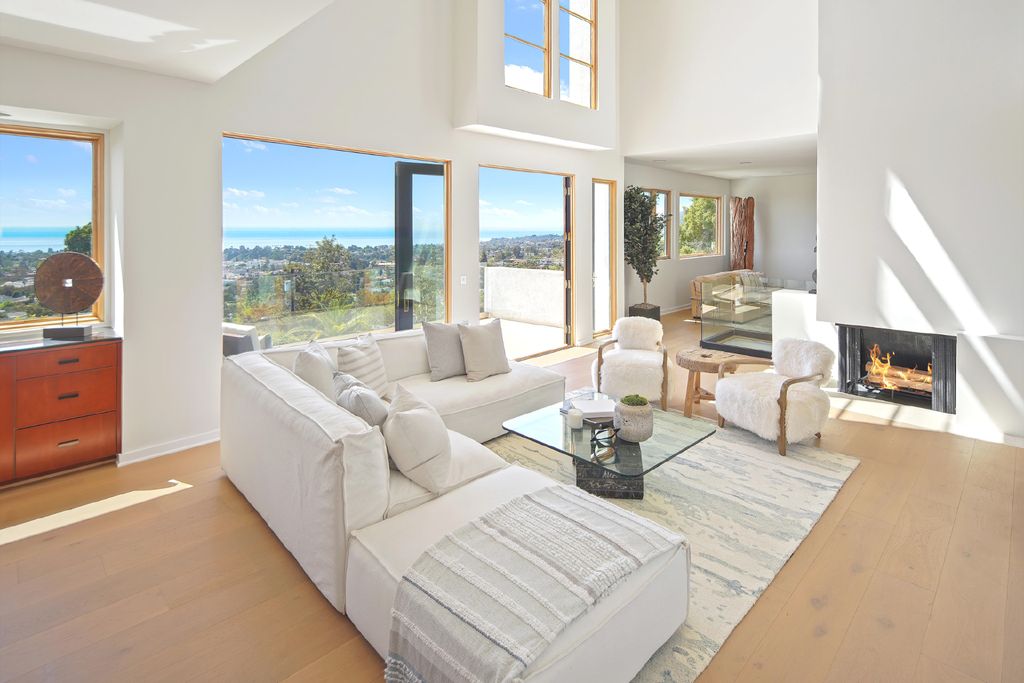The Pacific Palisades Home is a naturally sunlit estate Featuring expansive ocean views from every level now available for sale. This home located at 1345 Chautauqua Blvd, Pacific Palisades, California