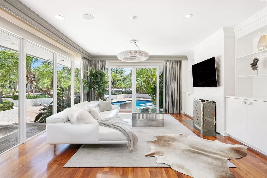 The Home in Boca Raton is a contemporary masterpiece cast in elegance, artful accents, and resort style sophistication now available for sale. This home located at 4400 Sanctuary Ln, Boca Raton, Florida