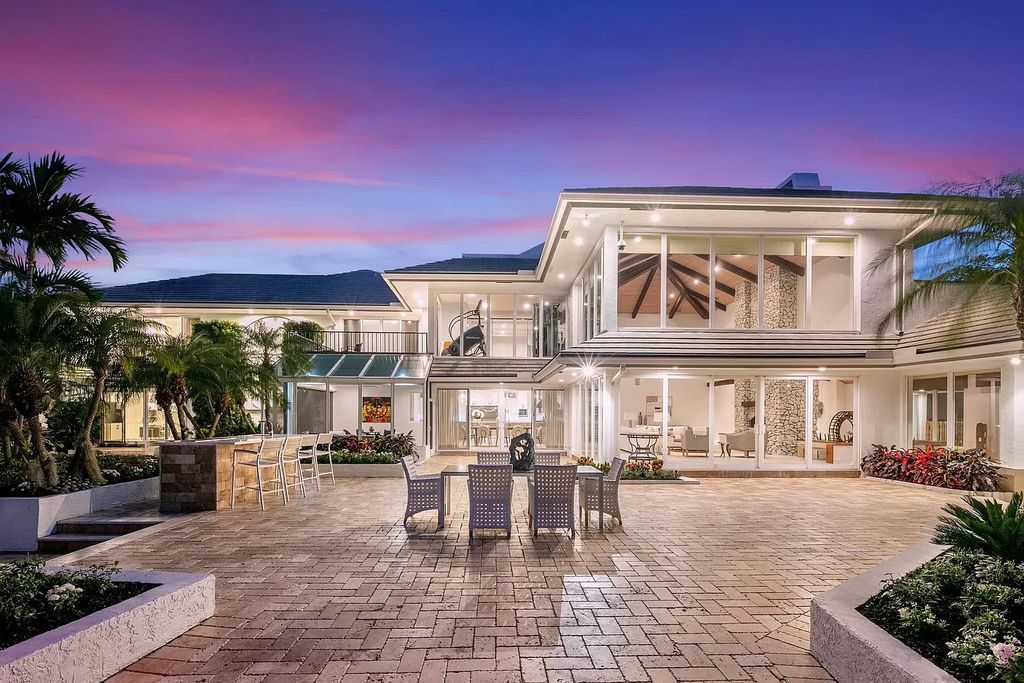 The Home in Boca Raton is a contemporary masterpiece cast in elegance, artful accents, and resort style sophistication now available for sale. This home located at 4400 Sanctuary Ln, Boca Raton, Florida