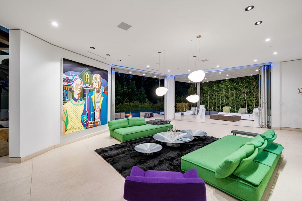 The Home in Bel Air is a modern architectural masterpiece nestled behind gates in a lush canyon setting with meticulously crafted living space now available for sale. This home located at 1006 Chantilly Rd, Los Angeles, California